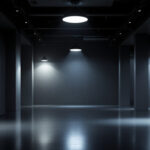 A photograph of a dimly lit architectural space showcasing various lighting designs