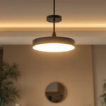 A photograph of a stylish and modern ceiling light fixture installed in a well-lit