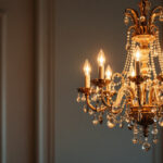 A photograph of a beautifully designed chandelier in an elegantly lit room