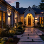 A photograph of a beautifully illuminated outdoor space featuring various styles of outdoor lights