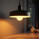 A photograph of a modern lighting fixture in a stylish interior setting