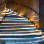 A photograph of a beautifully designed staircase featuring integrated led lights