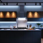 A photograph of a modern kitchen featuring stylish track lighting