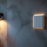 A photograph of a stylishly designed 3-way switch installed in a contemporary home setting