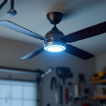 A photograph of a stylish garage ceiling fan with integrated lighting