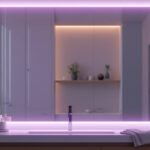 A photograph of a stylish led mirror in a modern bathroom setting