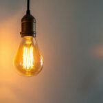 A photograph of a stylish and modern light fixture in an aesthetically pleasing setting