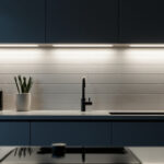 A photograph of a well-designed kitchen featuring sleek under-cabinet led lights illuminating the countertop