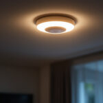 A photograph of a motion sensor ceiling light installed in a modern home setting