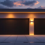 A photograph of a beautifully illuminated outdoor garage space at dusk