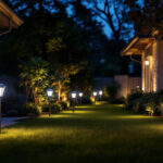 A photograph of a well-lit outdoor space showcasing various styles of solar outdoor lights in use