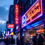 A photograph of a vibrant led sign installation in a bustling urban environment at dusk