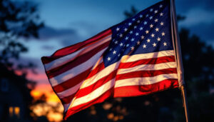 A photograph of a beautifully illuminated american flag at dusk