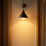 A photograph of a well-lit hallway featuring a stylish light fixture