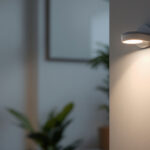A photograph of a stylish indoor space featuring a modern motion sensor light in action