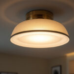A photograph of a stylish covered ceiling light fixture in a modern interior setting