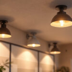 A photograph of a well-lit exterior space featuring stylish ceiling light fixtures that enhance the ambiance