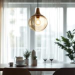 A photograph of a beautifully designed pendant lamp in a stylish interior setting