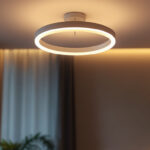 A photograph of a well-designed ceiling lamp installation in a modern interior setting