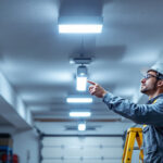A photograph of a well-lit garage featuring modern led ceiling lights