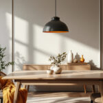 A photograph of a beautifully styled dining room featuring an elegant hanging lamp as the focal point