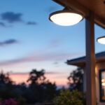 A photograph of a beautifully designed outdoor porch featuring stylish ceiling lights that illuminate the space