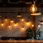 A photograph of a beautifully lit restaurant interior showcasing a variety of lighting fixtures and their effects on the ambiance