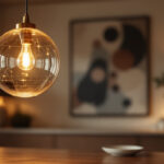 A photograph of a beautifully designed round pendant light hanging in a stylish interior setting