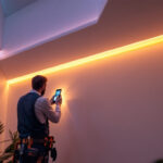 A photograph of a well-designed interior space featuring led cove lighting