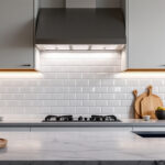 A photograph of a well-designed kitchen with stylish under cabinet lighting illuminating the countertops
