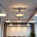 A photograph of a well-lit commercial space featuring a modern drop ceiling
