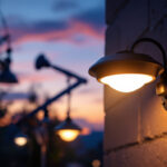A photograph of a solar-powered dusk-to-dawn light installed in an outdoor setting