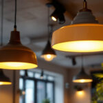 A photograph of a stylish interior space featuring suspended ceiling lights