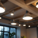 A photograph of a well-lit room showcasing a variety of canned ceiling lights