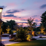 A photograph of a beautifully illuminated outdoor space featuring extra large post lights