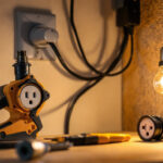 A photograph of a lighting contractor working on a residential installation