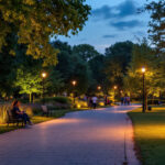 A photograph of a beautifully illuminated park at dusk
