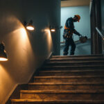 A photograph of a well-lit stairway featuring energy-efficient lighting solutions