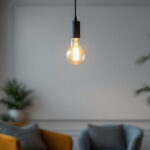 A photograph of a stylish single hanging light fixture in a modern interior setting