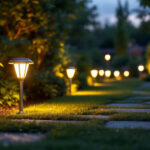 A photograph of a beautifully lit outdoor space featuring solar-powered led lights illuminating pathways and garden areas