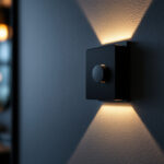 A photograph of a sleek black dimmer switch installed on a modern wall