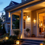 A photograph of a beautifully illuminated outside porch featuring a stylish smart lighting fixture