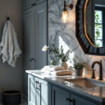A photograph of a beautifully designed bathroom featuring elegant vanity lighting