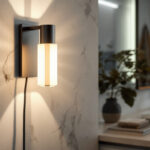 A photograph of a stylishly designed bright wall lamp installed in a modern bathroom setting