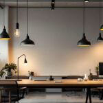 A photograph of a modern office space featuring a variety of lighting fixtures
