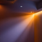 A photograph of a beautifully designed interior space showcasing directional recessed lighting in action