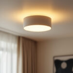 A photograph of a stylish ceiling flush mount light fixture installed in a well-lit room