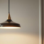 A photograph of a stylishly designed pendant light mounted in a modern setting