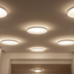 A photograph of a well-lit room featuring a variety of recessed lights in different configurations