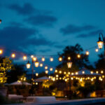A photograph of a beautifully illuminated outdoor space at dusk